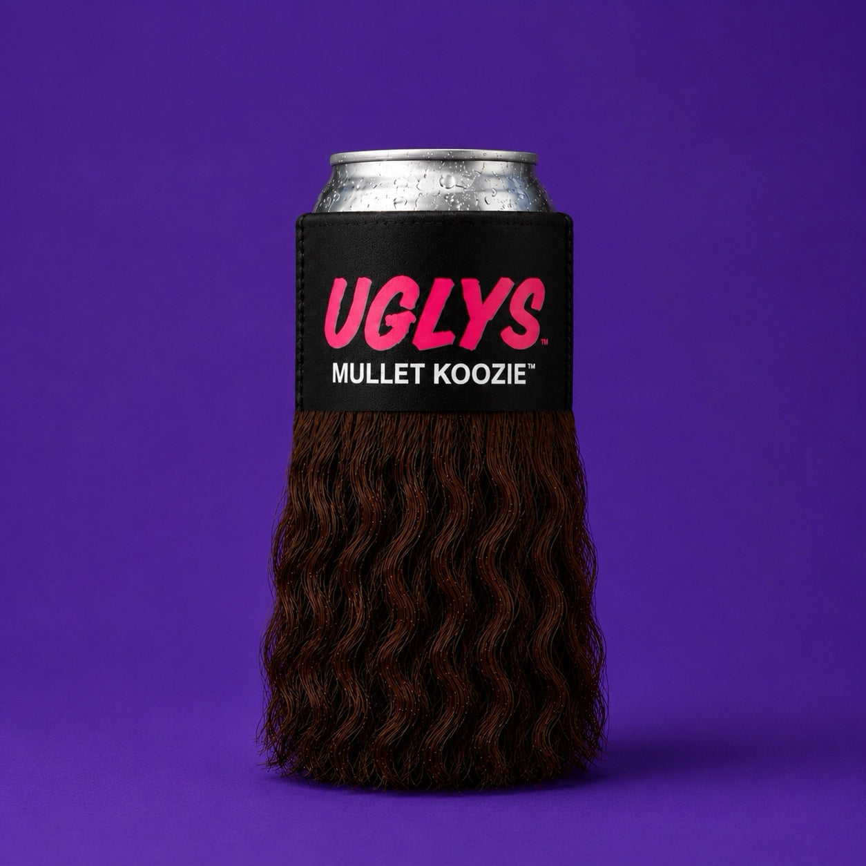 UGLYS™️ Mullet Koozie by Uglys Eyewear, black fabric drink holder with mullet design, fits standard cans and bottles.